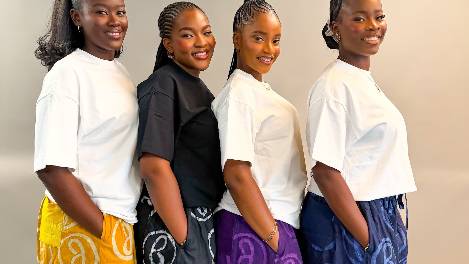 Five models wearing Jumbug tees and signature pants